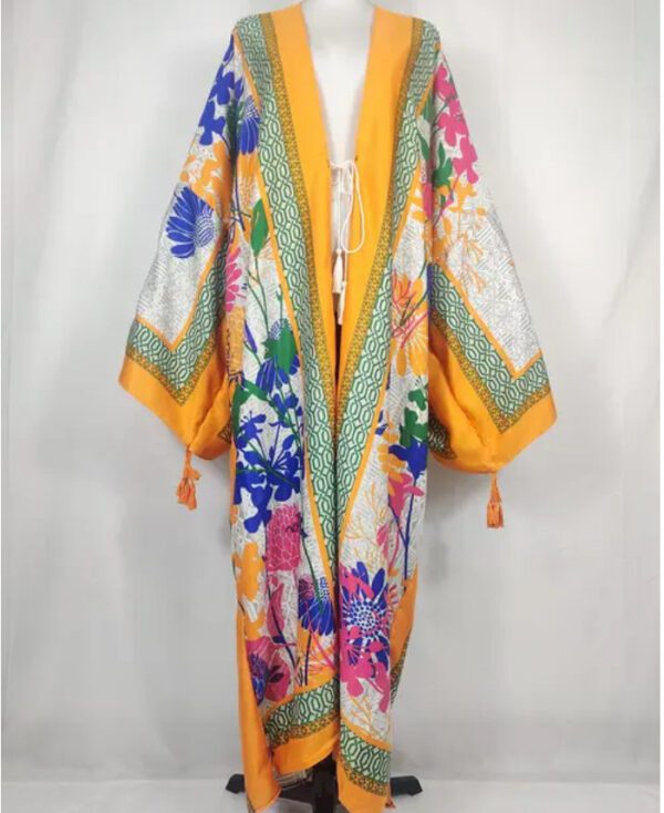 A kimono is shown with tassels.